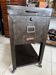 Vintage industrial filing cabinet on wheels