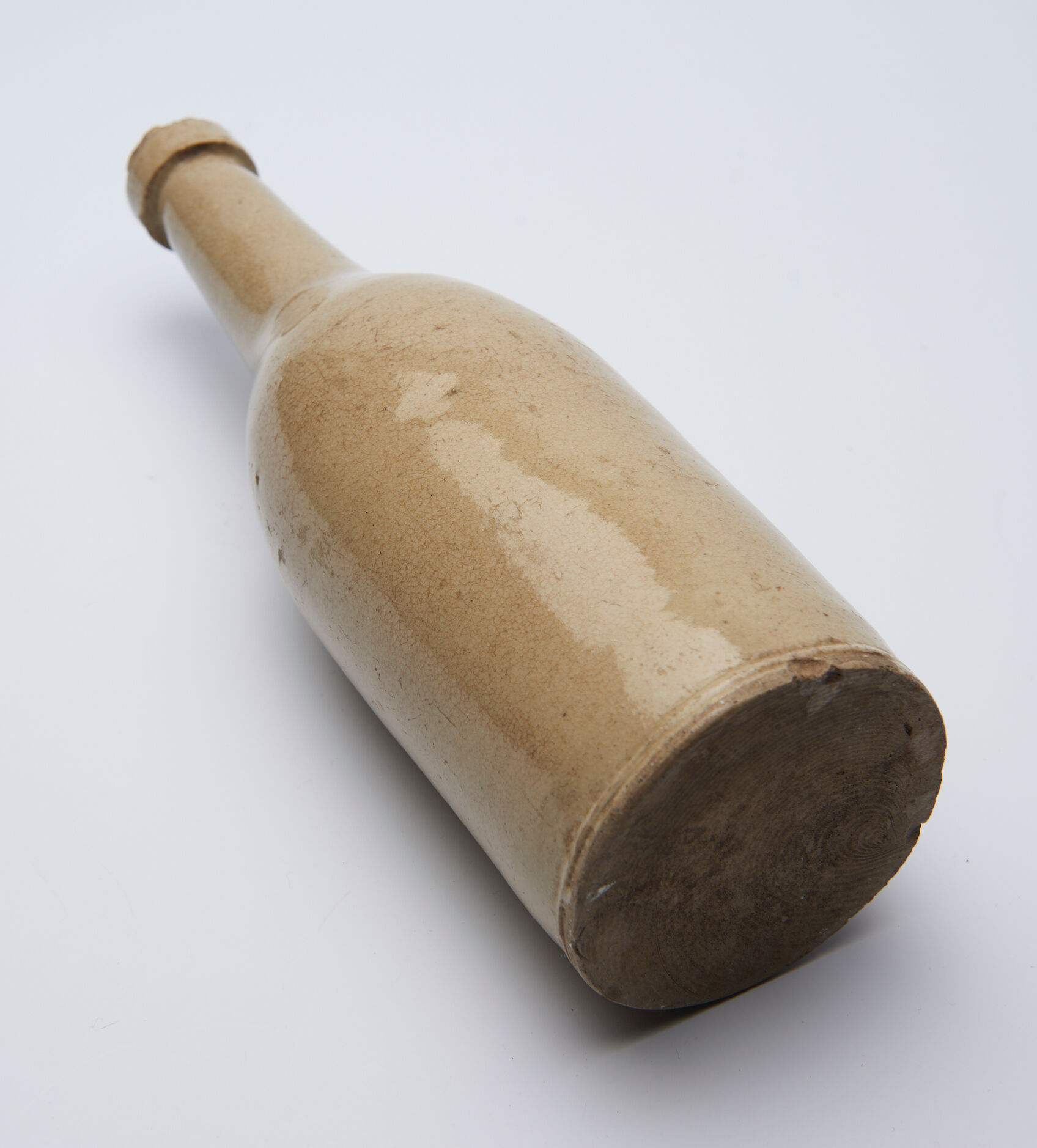 bottle in glazed and cracked sandstone