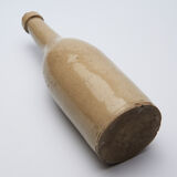 bottle in glazed and cracked sandstone