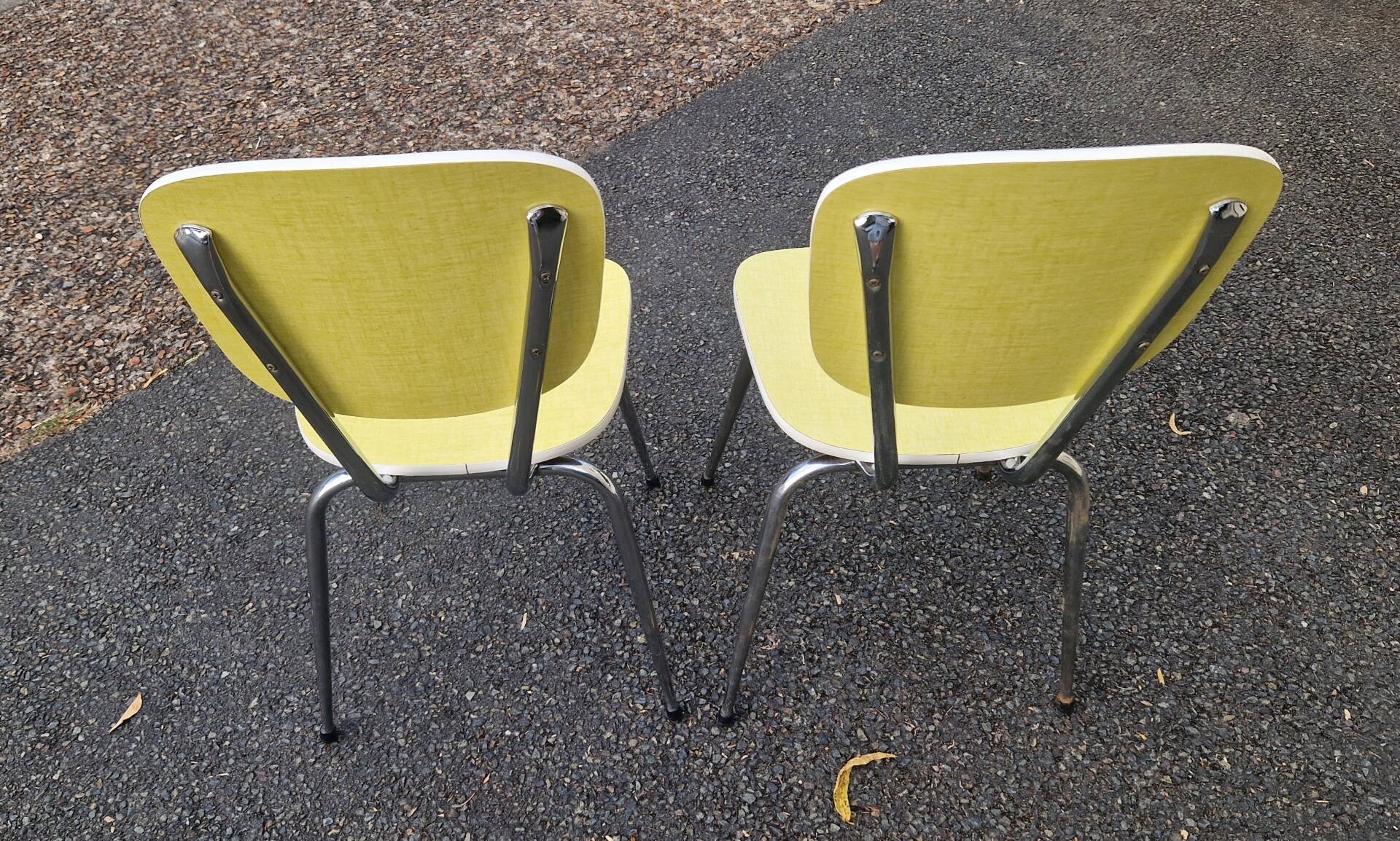 pair of yellow Formica chairs