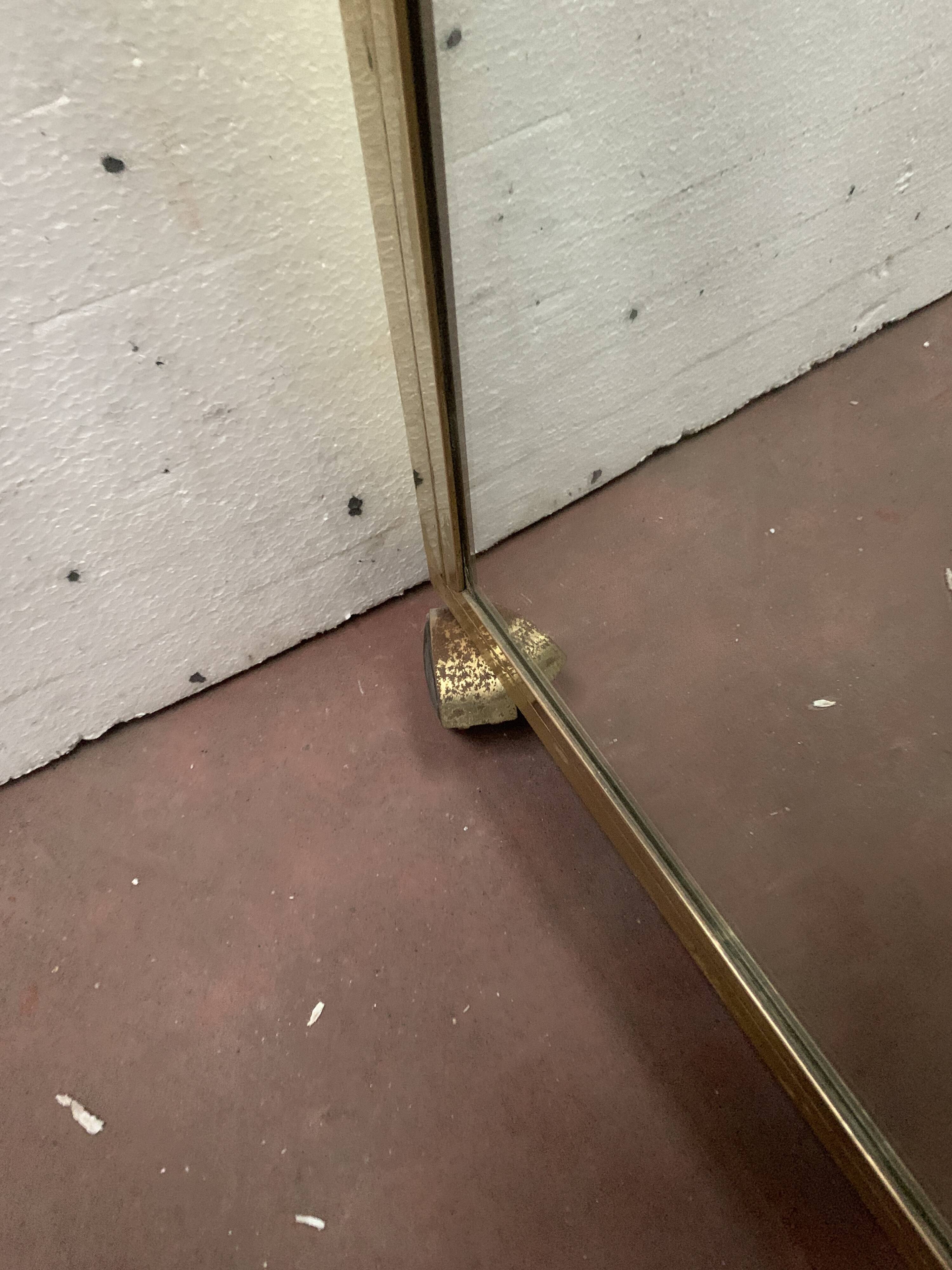 1970s brass bar with a mirrored front from the 20th century.