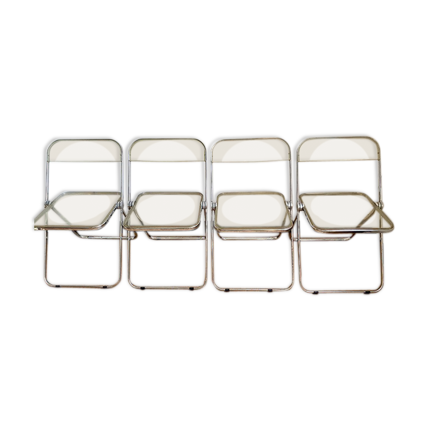 Four Plia folding chairs by Giancarlo Piretti edited by Castelli