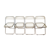 Quatre chaises pliantes Plia de Giancarlo Piretti éditées par Castelli