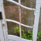 Art Nouveau double doors with small panes.