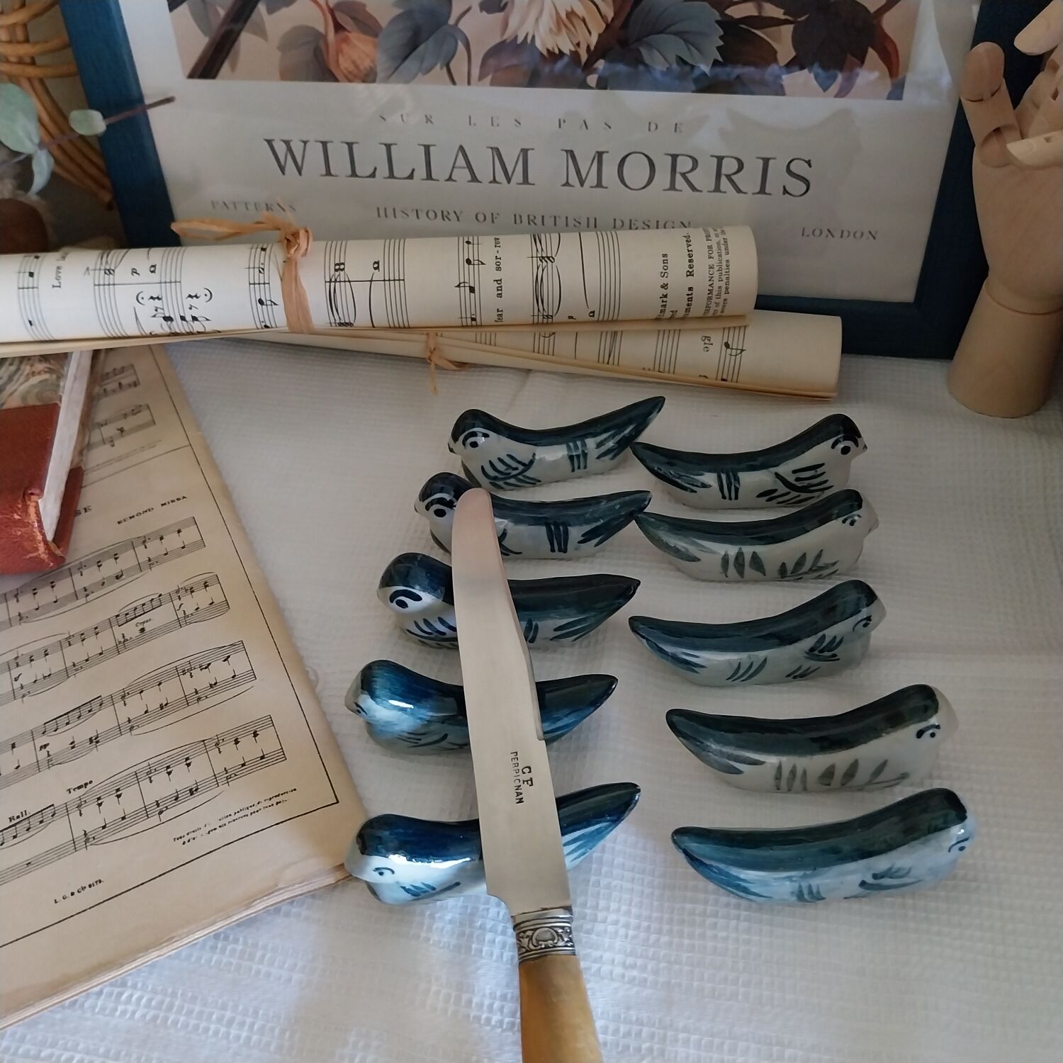 Ceramic knife rests in the shape of birds