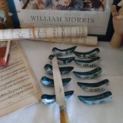 Ceramic knife rest in the shape of birds.