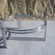 Chrome and glass tripod coffee table