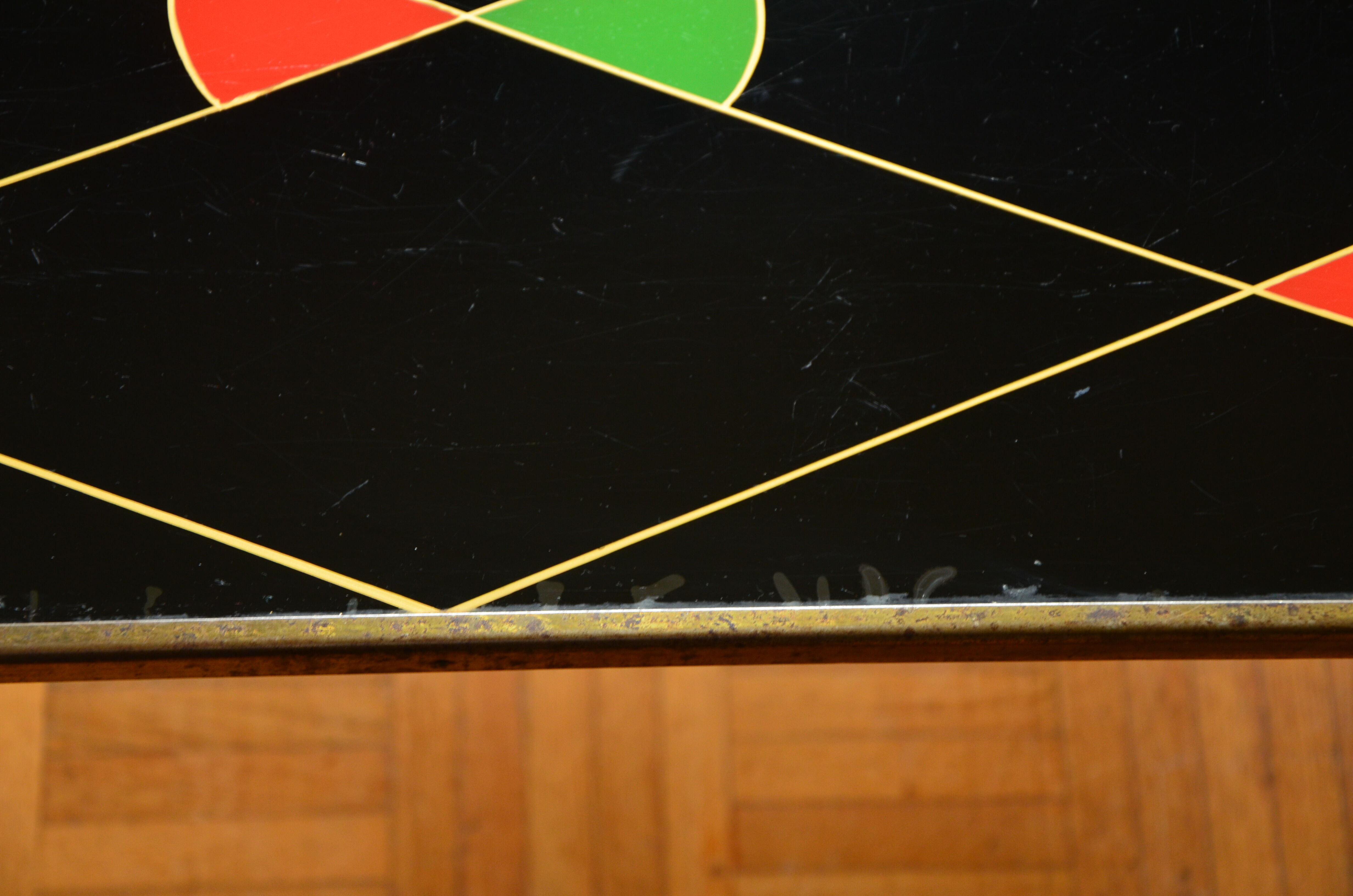 Brass and glass coffee table with compass feet