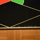 Brass and glass coffee table with compass feet