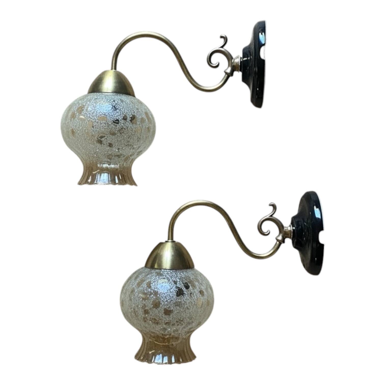 Pair of antique wall sconces in brass with tulip-shaped glass shades.