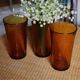 A set of 3 large amber orange glasses Duralex Vintage.