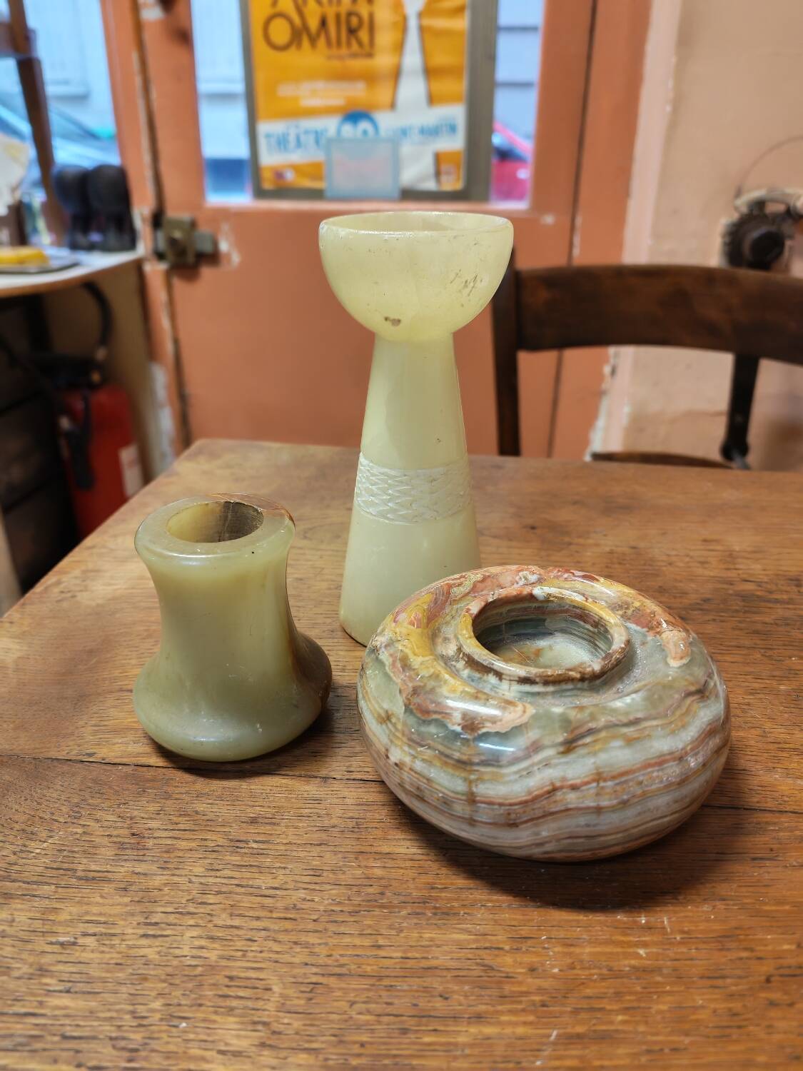 Set of three marble candlesticks