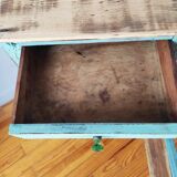 Patinated bedside table end of sofa