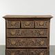 Richly carved English oak chest of drawers from the 18th century