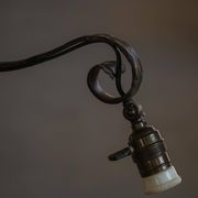 20th-century wrought iron floor lamp with swirling detail, Danish Art Deco.