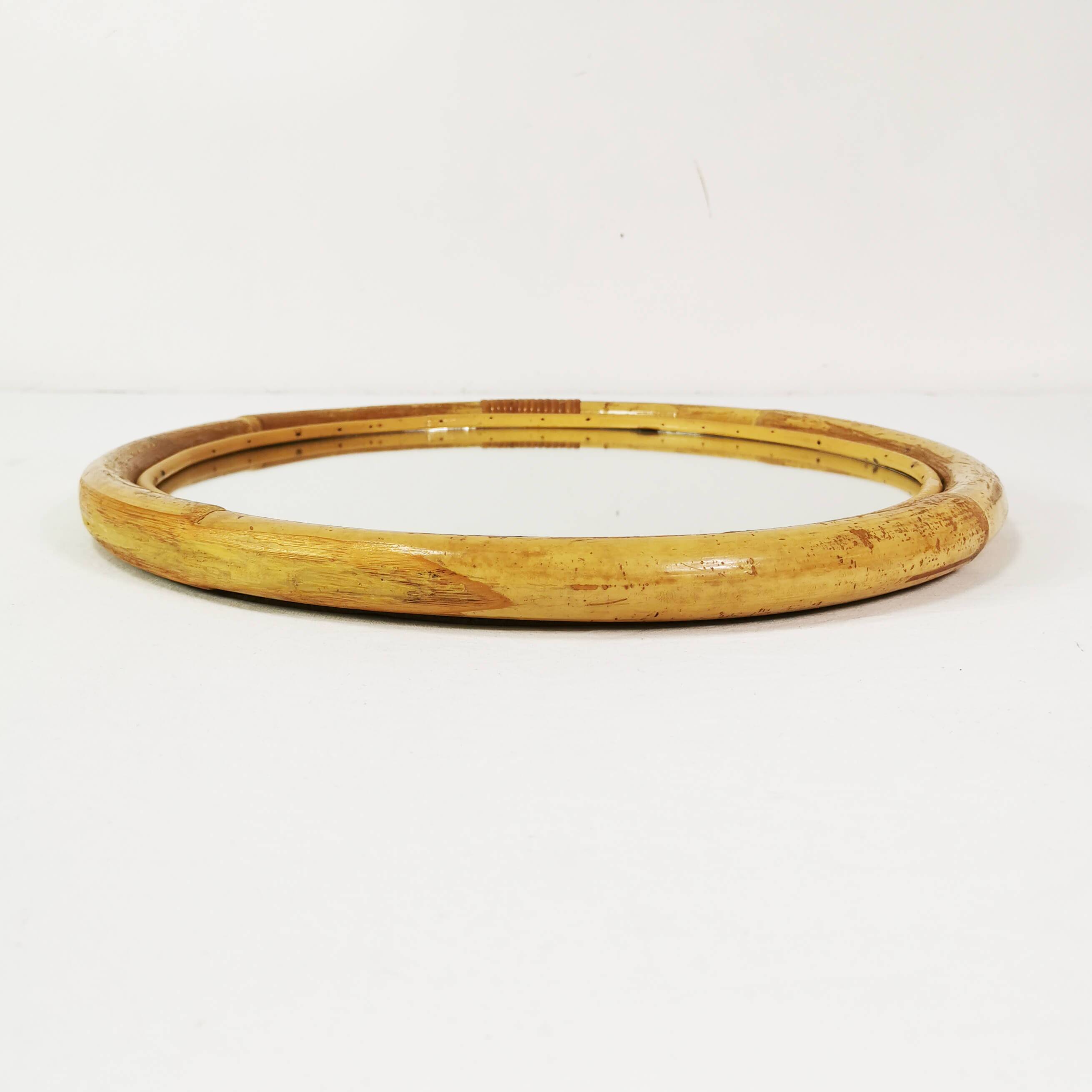 Wall-mounted, round bamboo mirror, Germany, 1970s.