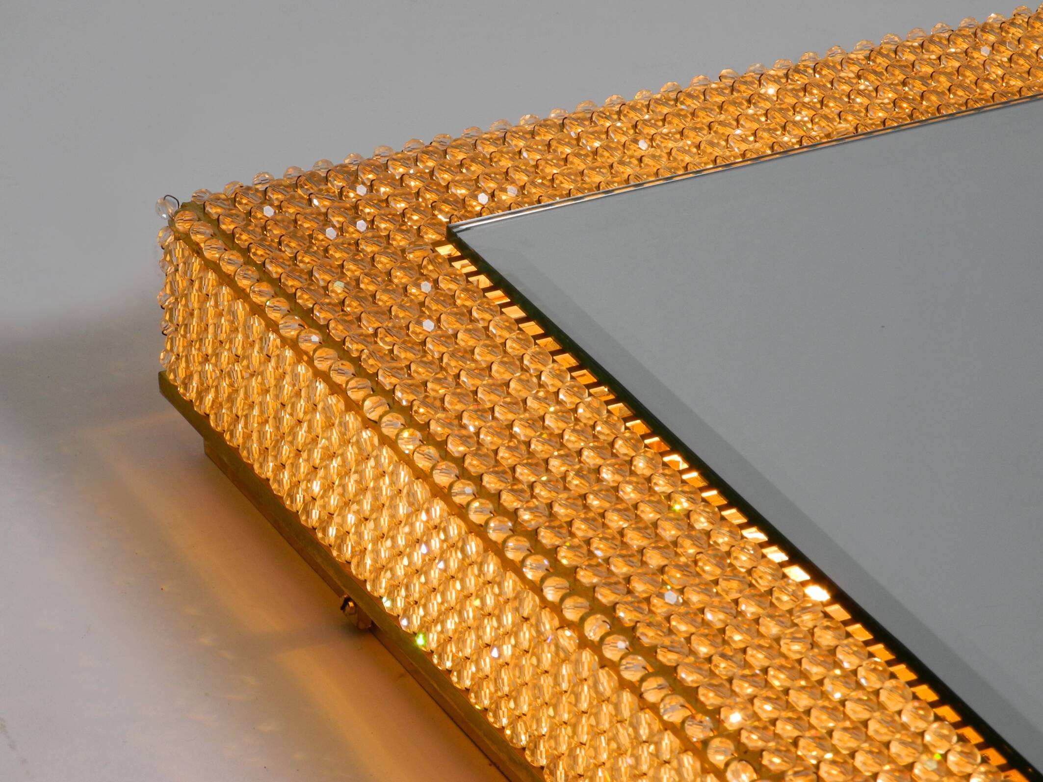 1960s brass wall backlit mirror, frame with glass beads by Palwa