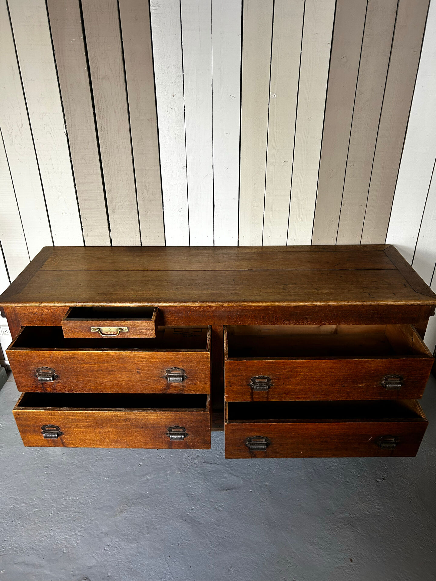 Large antique haberdashery counter in oak