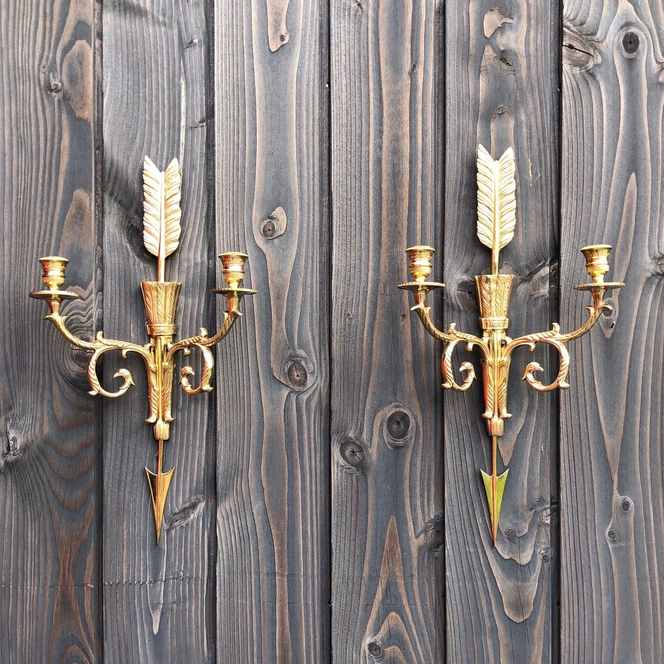 Pair of wall lamps decorated with bronze arrows "Cupid"