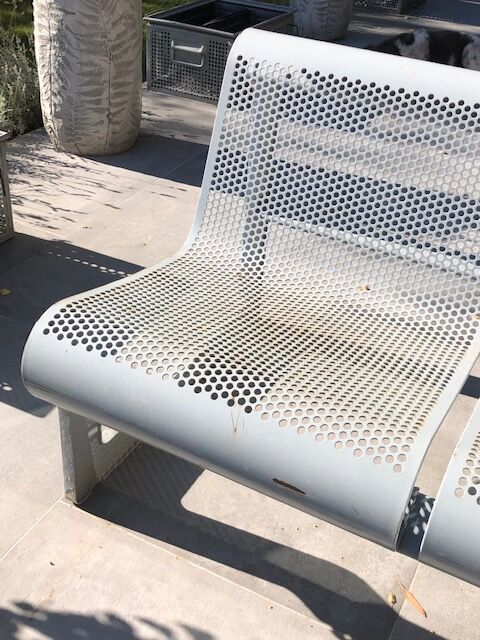 Perforated metal garden bench