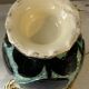 Pair of Vallauris vases in turquoise and black ceramic enhanced with o