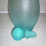 Transparent blue decanter with bubbles