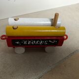 Small vintage train in multicolored wood