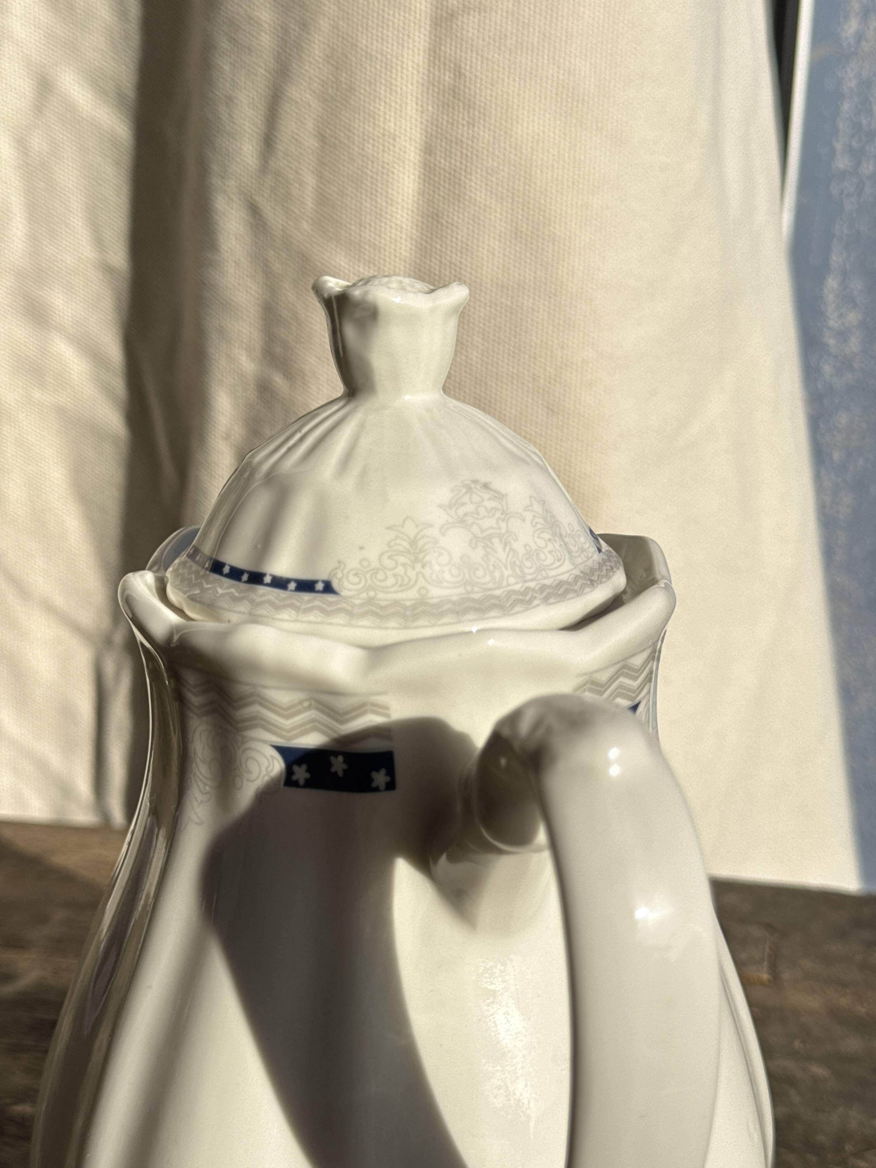 White earthenware teapot with blue and silver trim H22.5