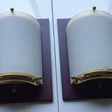 Four vintage gold wall lights with opaline globes on wooden support