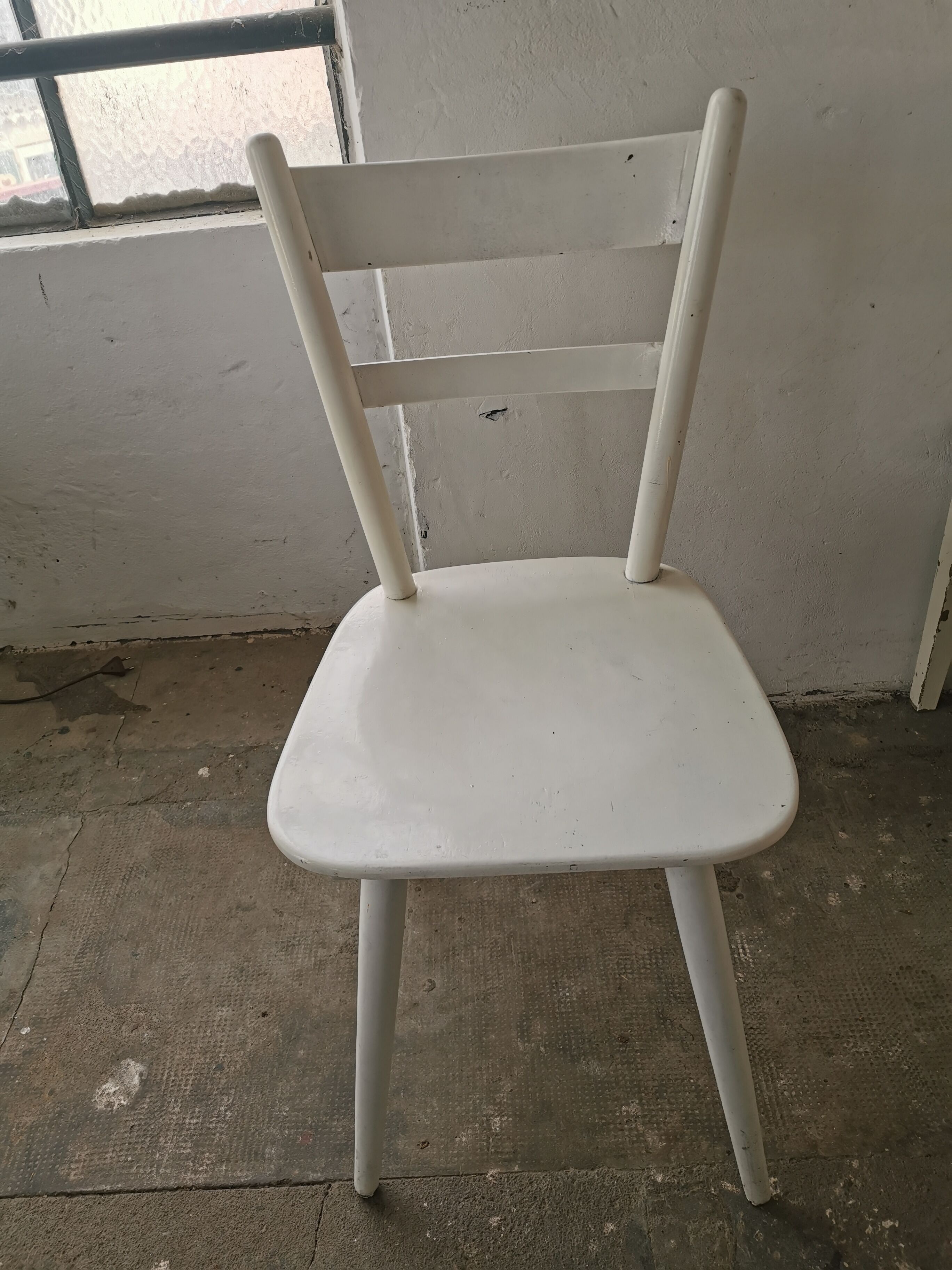 Set of 6 mismatched white chairs