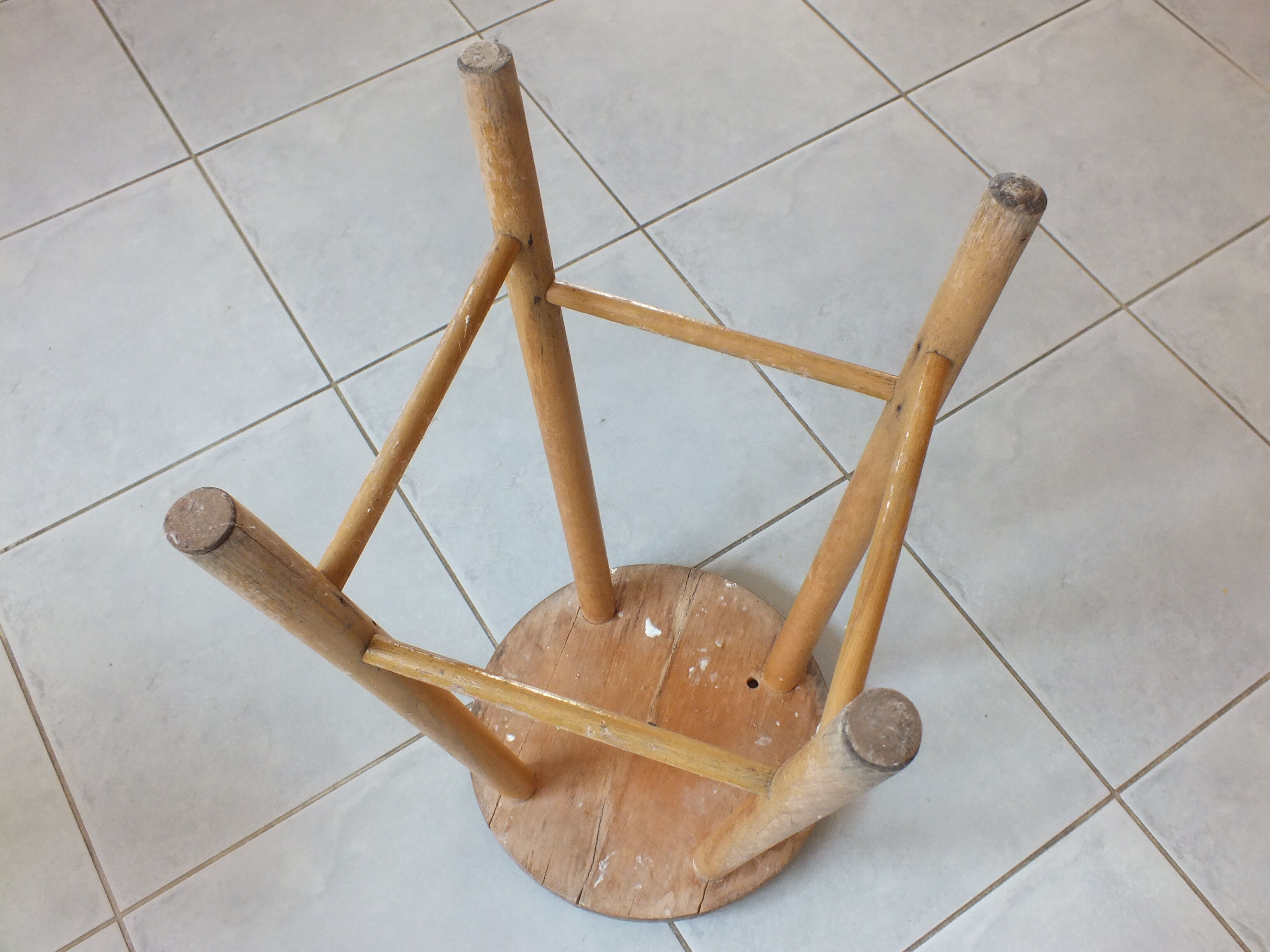 Vintage stool in patinated natural wood