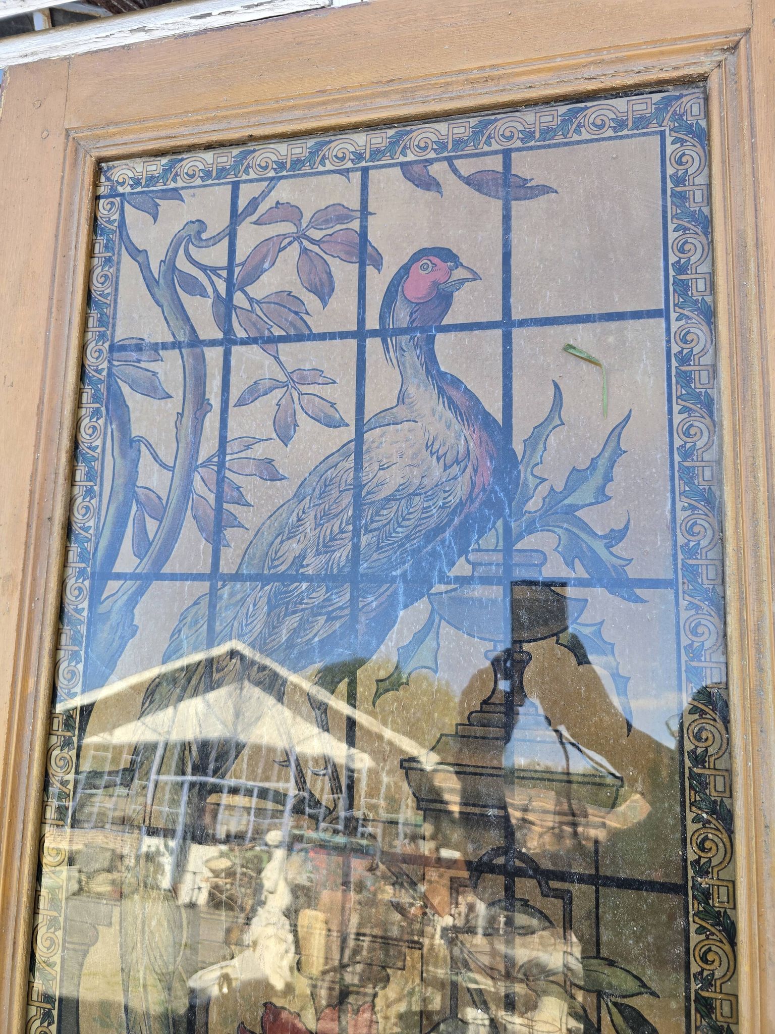 old door with decorated window