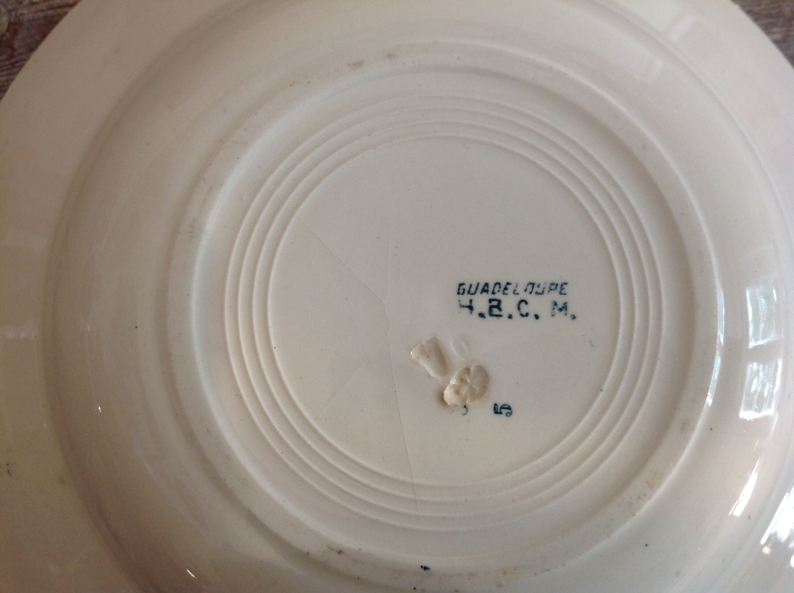 Set of 12 deep terre de fer plates