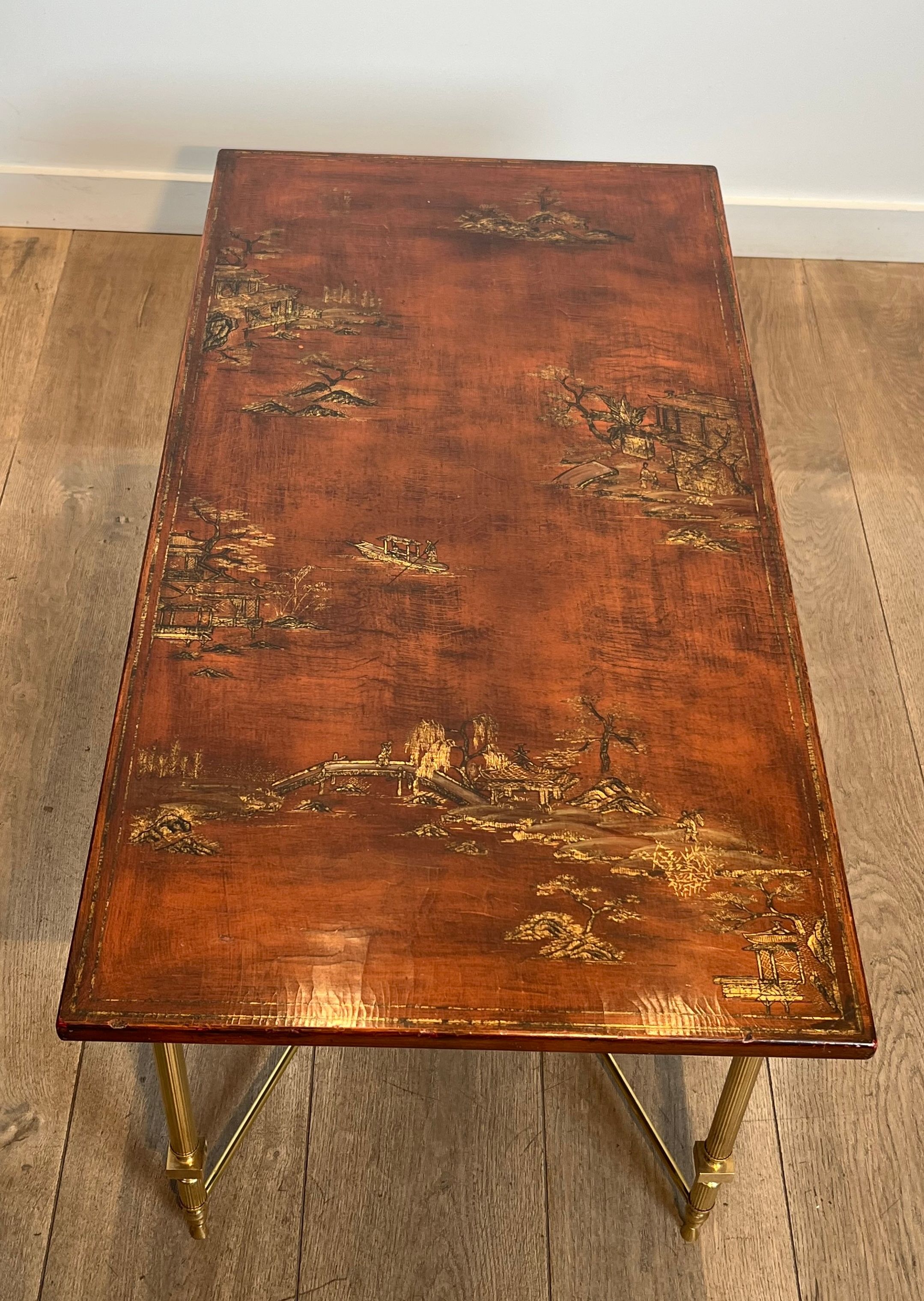 Neoclassical style brass coffee table with lacquered top depicting chinoiserie scenes, attributed to Maison Jansen