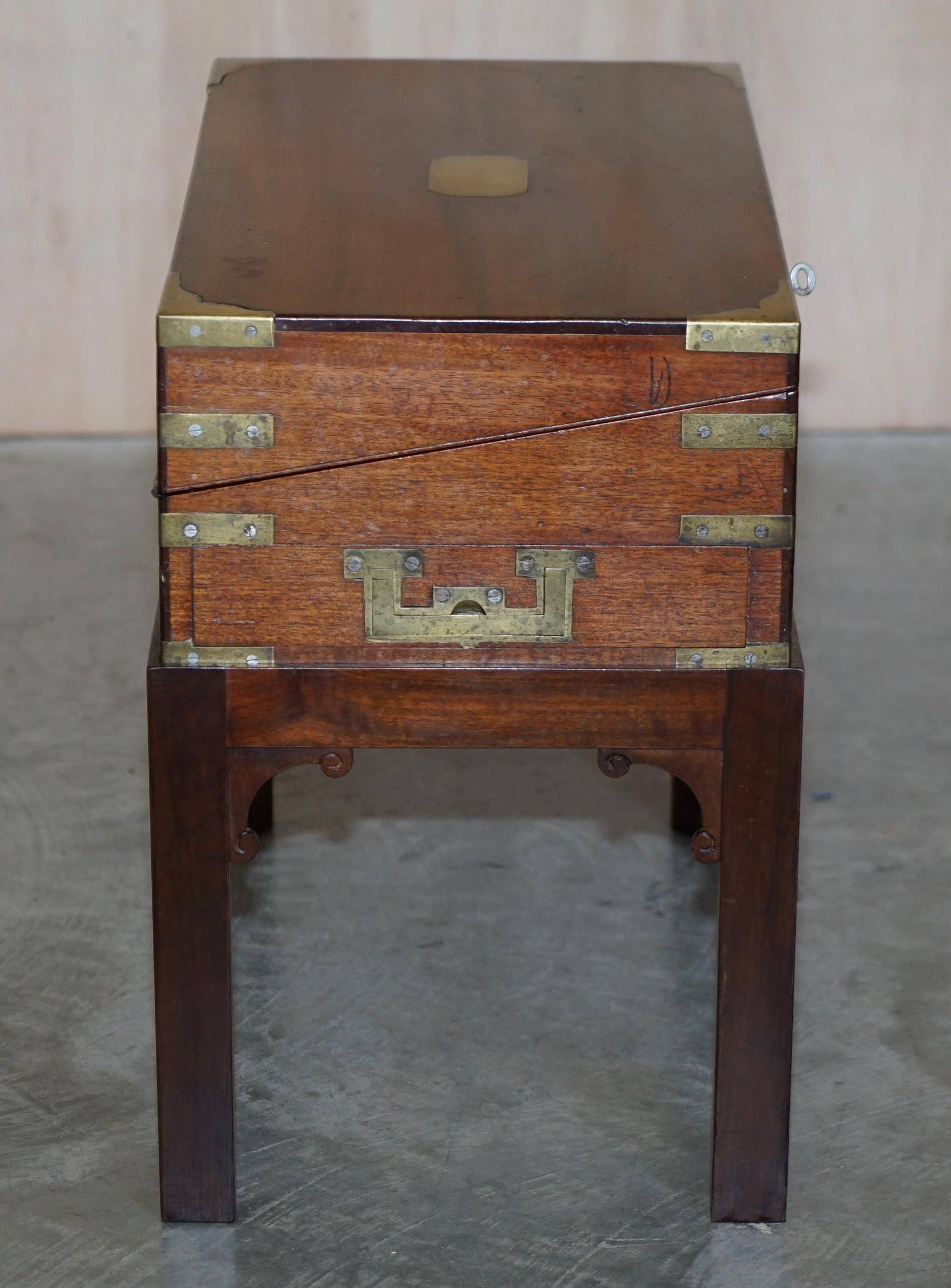 Antique hardwood military campaign desk with writing slope.