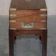 Antique hardwood military campaign desk with writing slope.