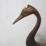 Brass heron standing