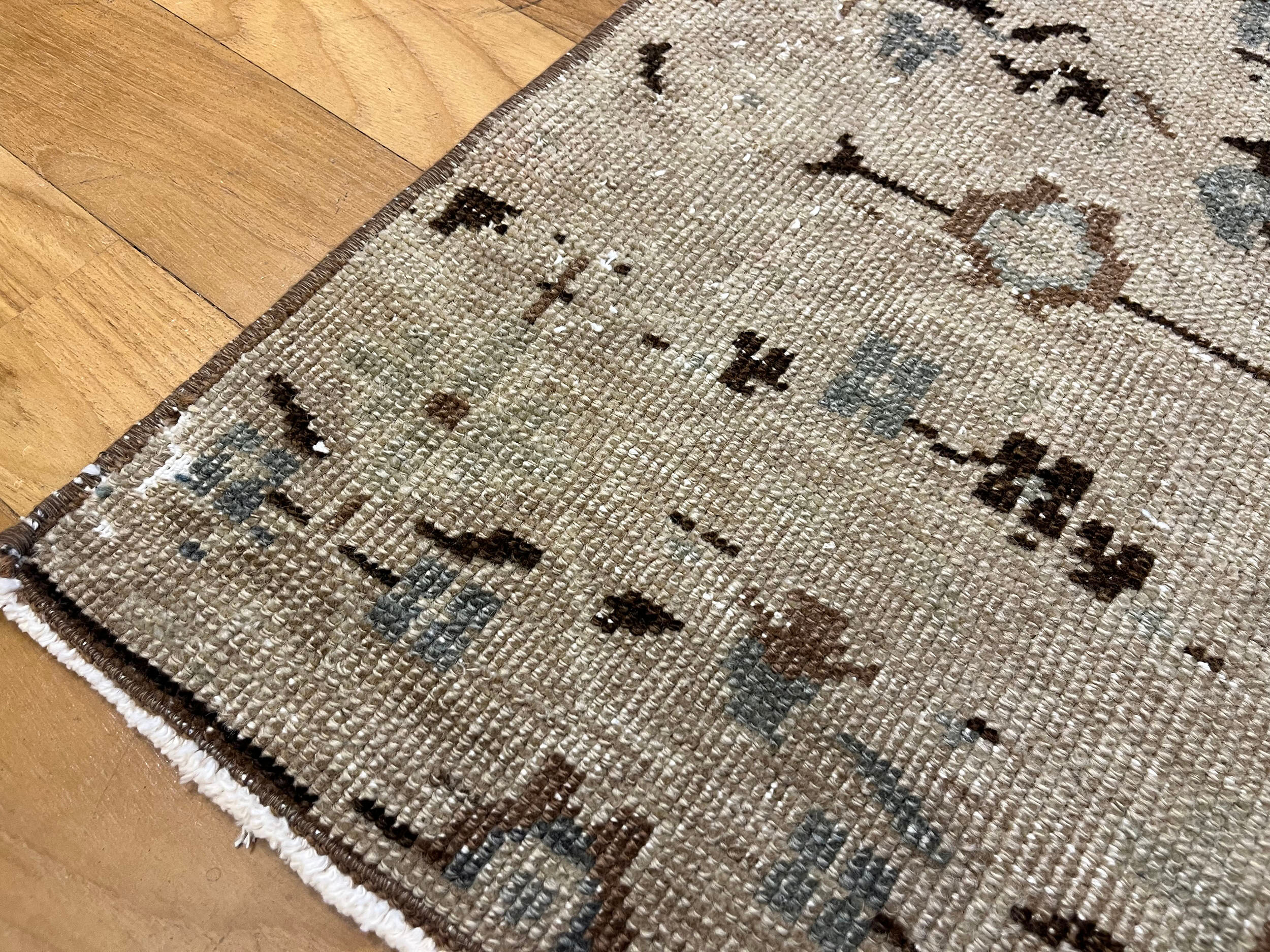 Unique aztec design muted handmade old rug