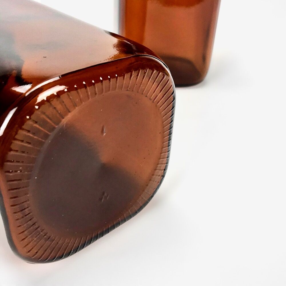 Pair of amber glass jars