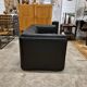 Two-seater sofa in black leather, designed by Tito Agnoli for Poltrona Frau, Italy, 1980s