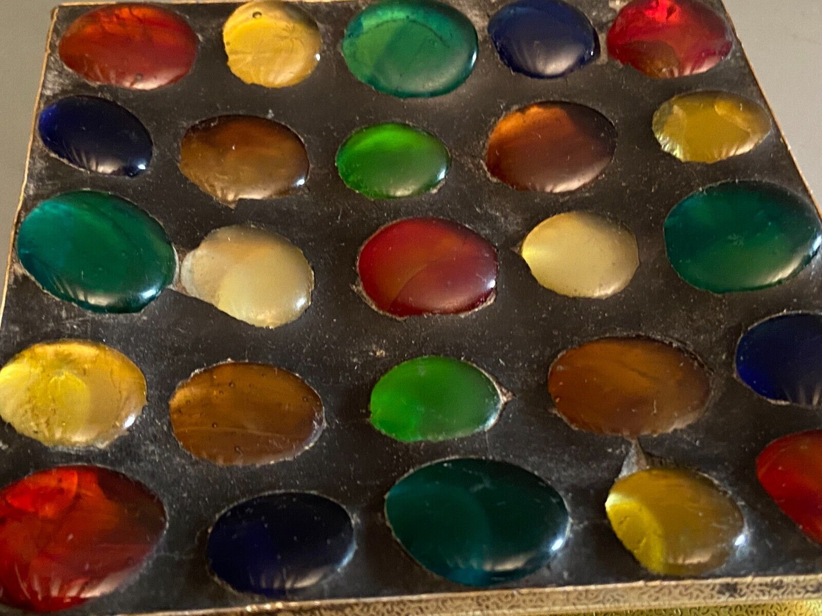 Square section cut glass and metal decorated with multicolored glass cabochons