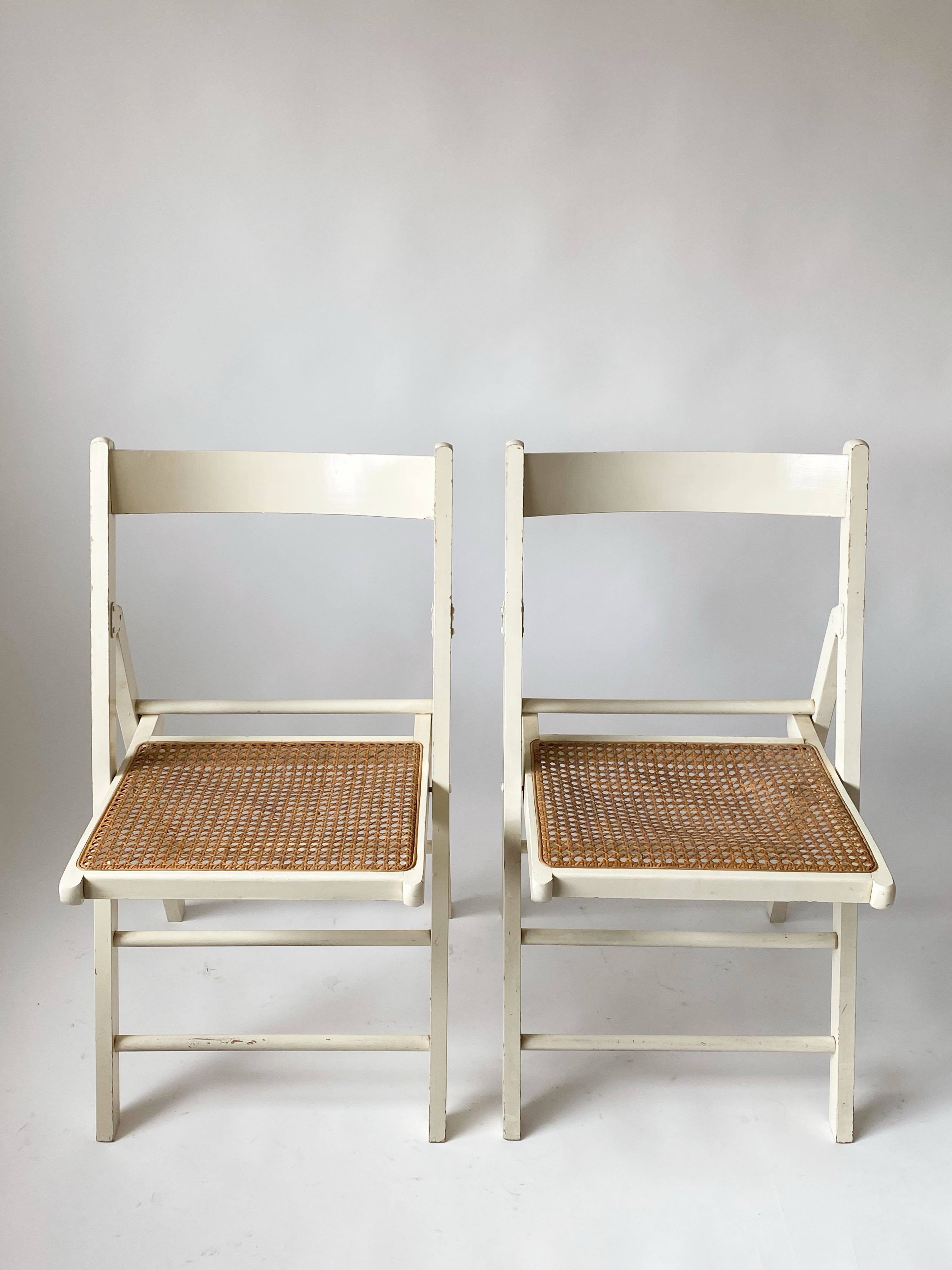 Pair folding chairs caning