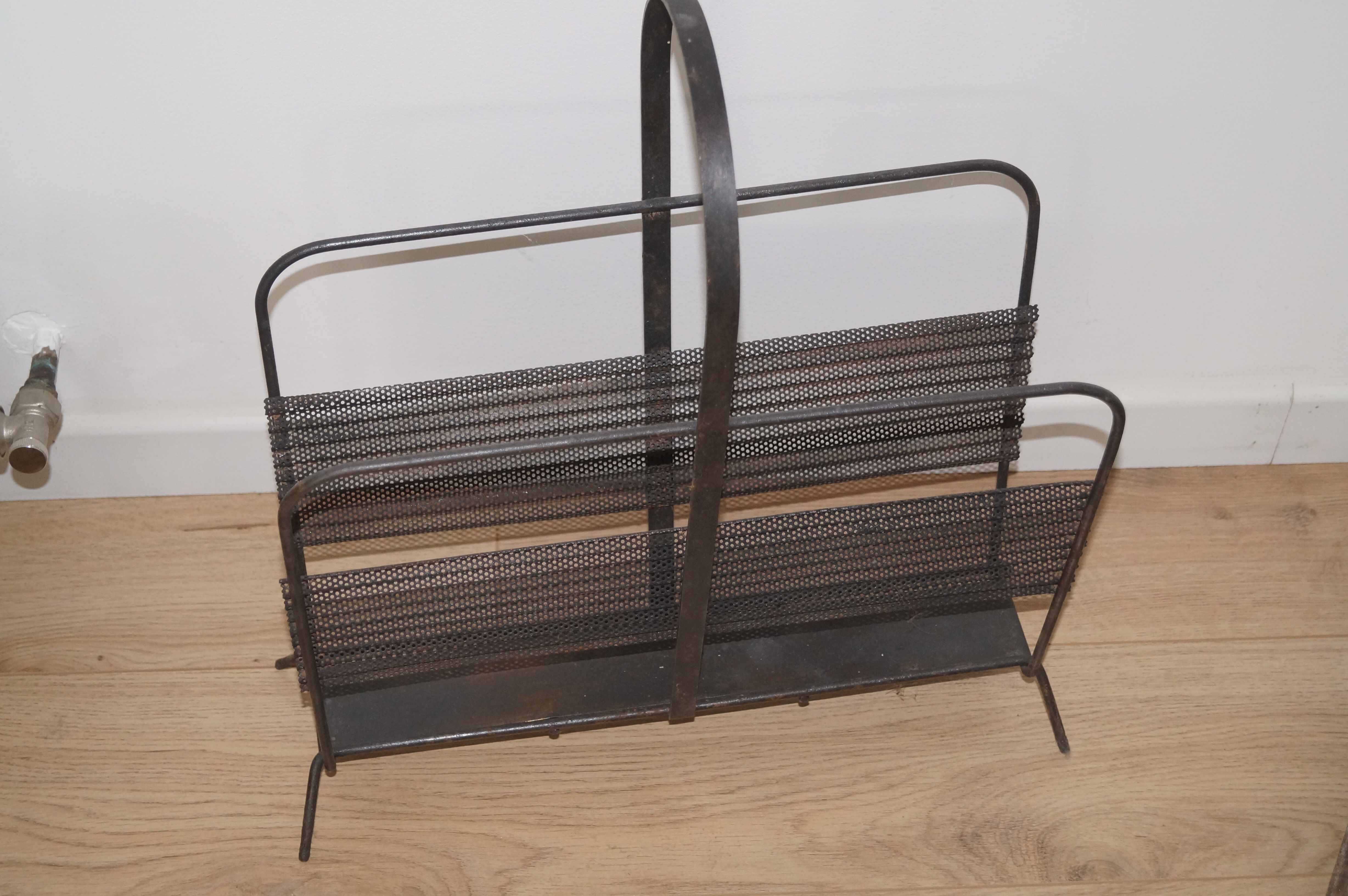 Vintage magazine rack by Mathieu Mategot