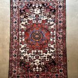 Persian carpet in wool and silk, old rose.