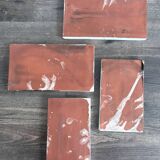 Lot of 4 rectangular glazed terracotta plates.