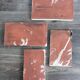 Lot of 4 rectangular glazed terracotta plates.