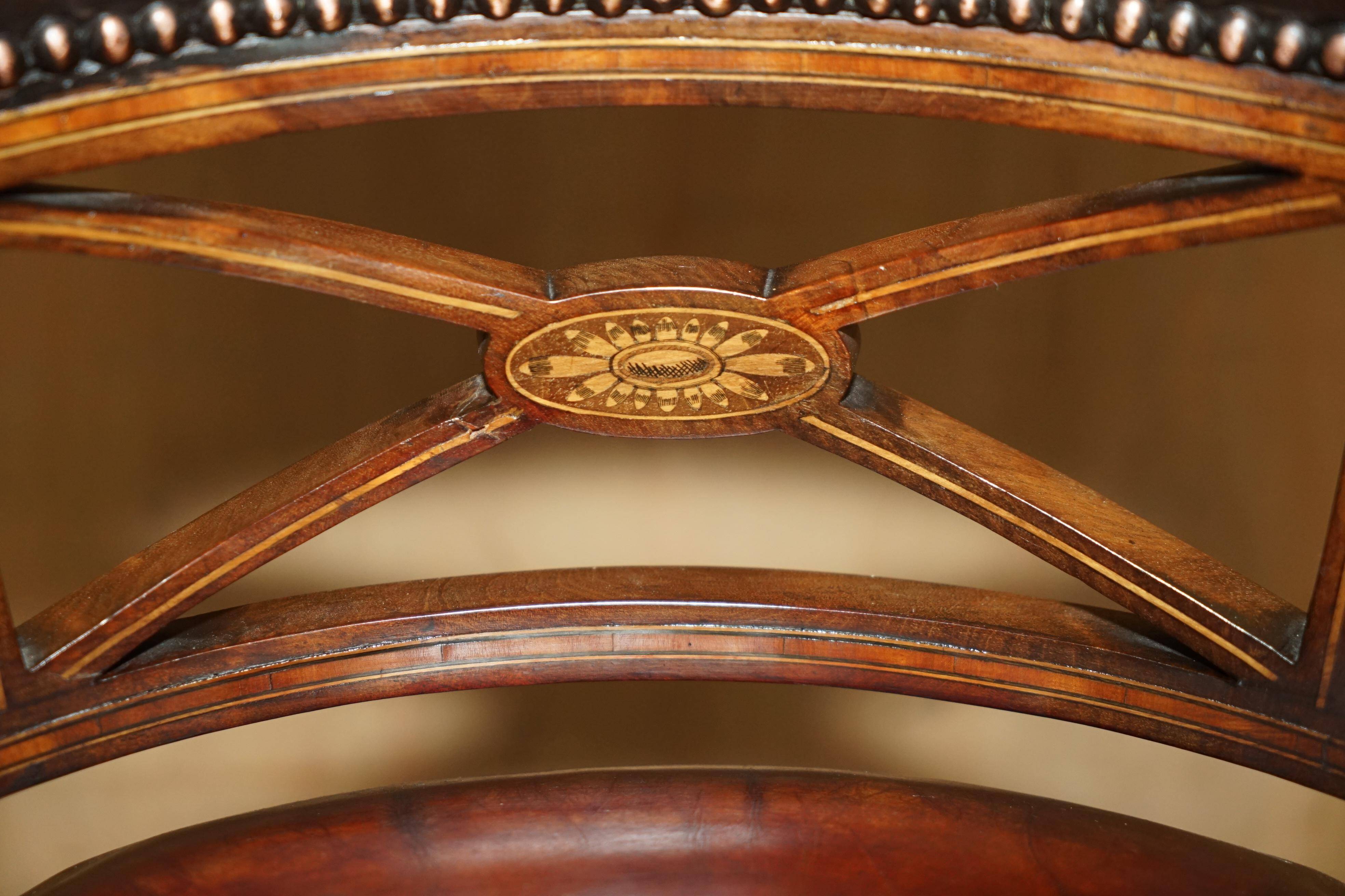 Victorian captain's chair in leather restored by Cornelius V Smith.