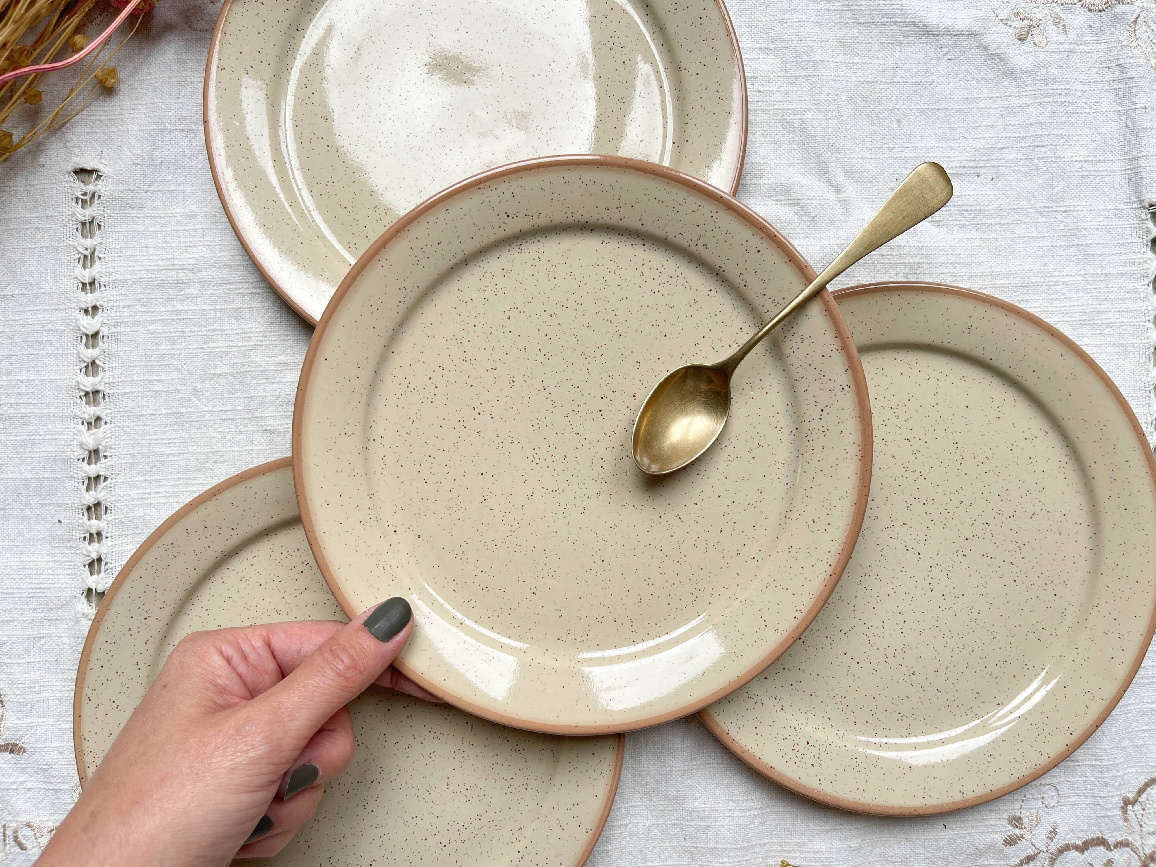 4 Small plates in speckled stoneware, Tulowice style, mid-century, 20th century