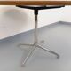 Vintage Eames round table for Vitra in white melamine, wood, and metal.