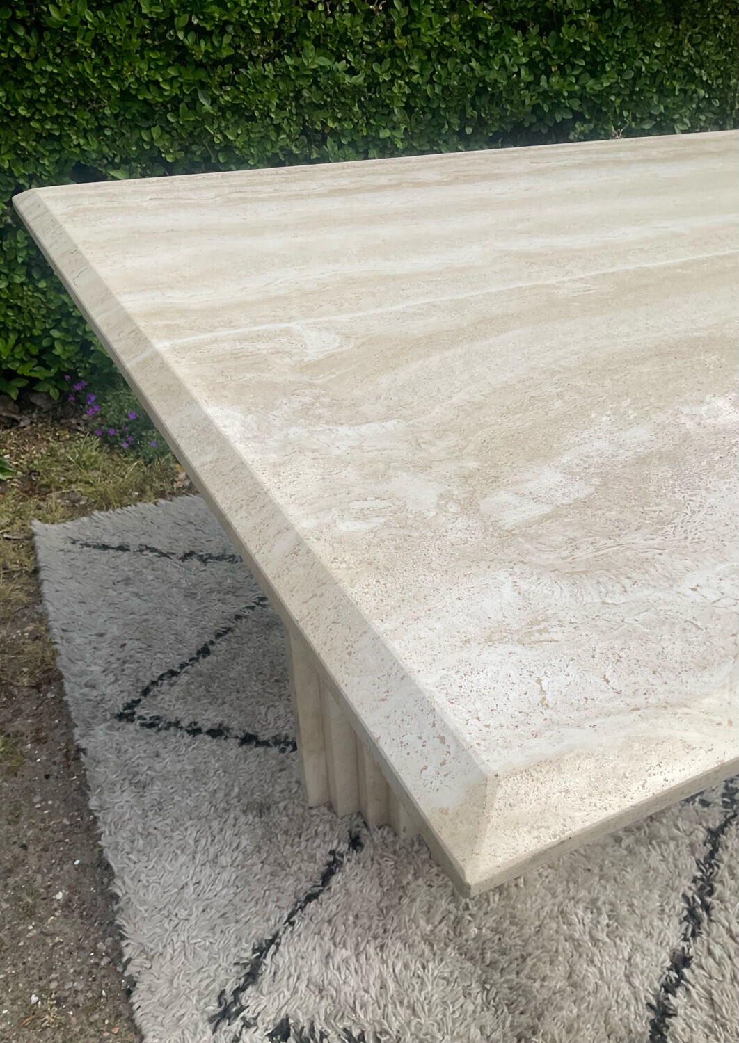 Large vintage dining table in travertine in the 1970s Carpa style.